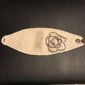 winter head warmer with flower detail